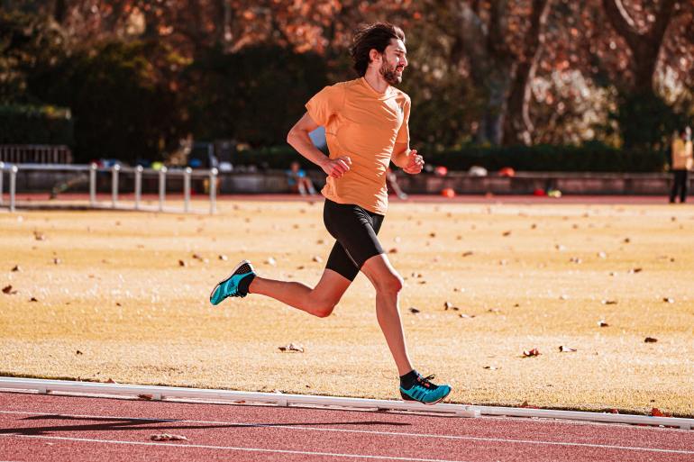 Man Running on Stadium