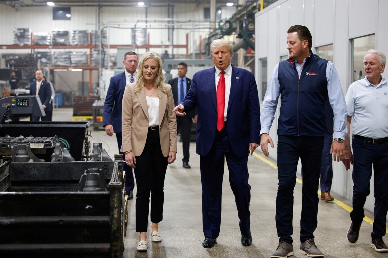 Former U.S. President and Republican presidential candidate Donald Trump tours Drake Enterprises, a non-union automotive parts manufacturer, on the day he addresses auto workers as he skips the second GOP debate, in Clinton Township, Michigan, U.S., September 27, 2023. REUTERS/Rebecca Cook