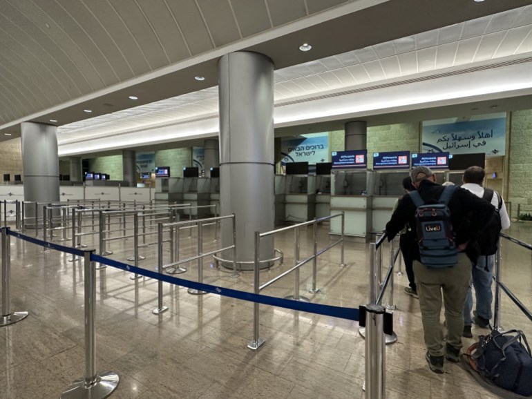 TEL AVIV, ISRAEL - OCTOBER 8: A few people line up in the passport section for international arrivals at empty Ben Gurion Airport, Israel's only international airport, after many flights from abroad are cancelled due to the attacks launched by Palestinian factions in Tel Aviv, Israel on October 8, 2023. ( Turgut Alp Boyraz - Anadolu Agency )