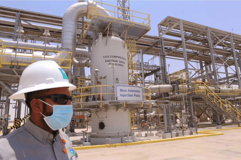 An employee near the blue ammonia injection point at the Hawiyah Natural Gas Liquids Recovery Plant, operated by Saudi Aramco, in Hawiyah, Saudi Arabia, on Monday, June 28, 2021. The Hawiyah Natural Gas Liquids Recovery Plant is designed to process 4.0 billion standard cubic feet per day of sweet gas as pilot project for Carbon Capture Technology (CCUS) to prove the possibility of capturing C02 and lowering emissions from such facilities. Photographer: Maya Siddiqui/Bloomberg via Getty Images