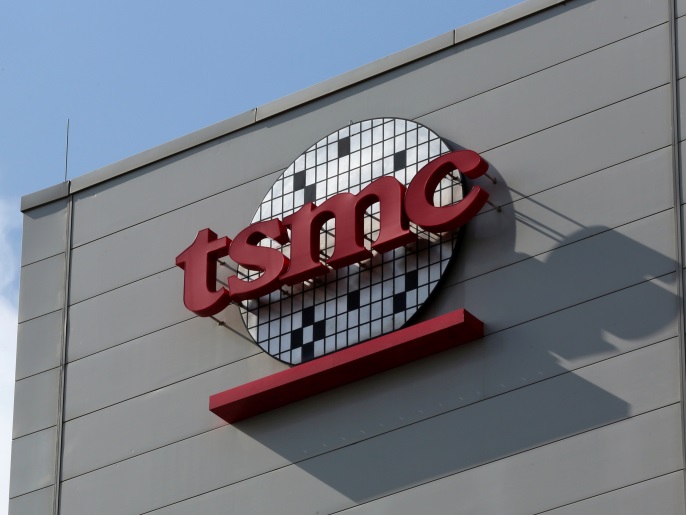 A logo of Taiwan Semiconductor Manufacturing Co (TSMC) is seen on a wall of its headquarters in Hsinchu, Taiwan October 5, 2017. Picture taken October 5, 2017. REUTERS/Eason Lam