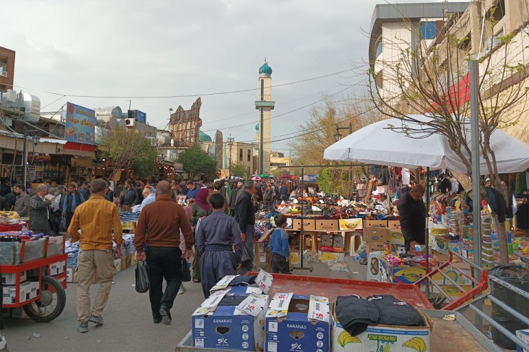 صورة عامة عن احد اسواق السليمانية يعمل فيها السوريين بأسعار زهيدة جدا جدا المصدر الجزيرة