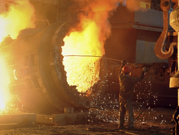 A steel worker operates a furnace at a steel manufacturing plant in Hefei, Anhui province in this July 12, 2011 file photo. Iron ore is enjoying its biggest rally in years, outpacing copper and oil so far in 2016, but still weak forward prices show it may be tough to stretch the bullish outlook. Improving steel prices in top market China are helping fuel iron ore's climb as producers gear up for a seasonal uptick in demand. Yet there is no shortage of doubters who see gains in the bulk commodity as fleeting given a large glut and challenges for China's economy. REUTERS/Stringer/Files