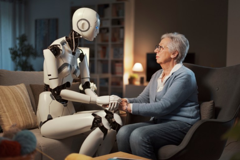 An elderly woman confides her psychological distress to her robotic assistant. Concept of psychological support thanks to A.I.