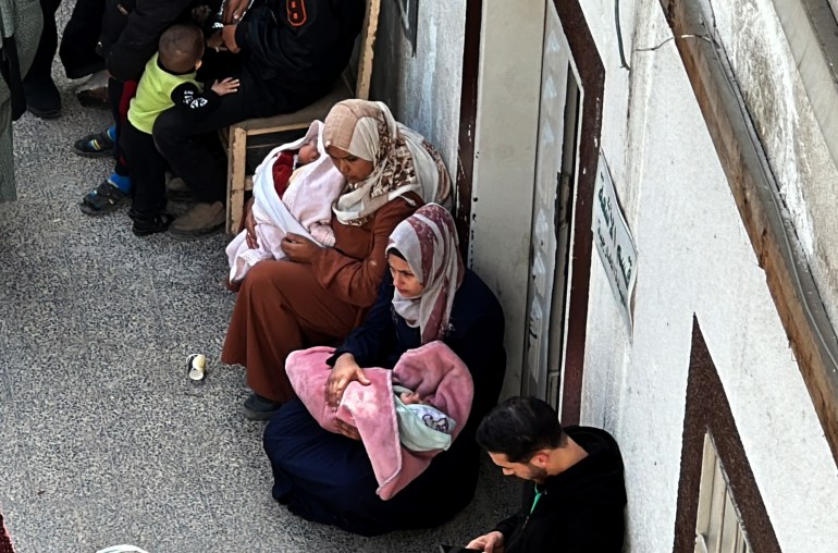 BEIT LAHIA, GAZA - MARCH 06: The front of Kemal Adwan Hospital in Beit Lahia, north of Gaza City is viewed as Palestinian mothers waiting outside the hospital for baby formula, on March 06, 2024. As Israel's attacks on the Gaza Strip continue unabated, Palestinians are unable to obtain many vital needs, including basic food supplies, due to the total embargo imposed on the territory. Mothers waited in front of Kemal Adwan Hospital in the hope that charities would bring baby formula to the hospital. (Photo by Karam Hassan/Anadolu via Getty Images)