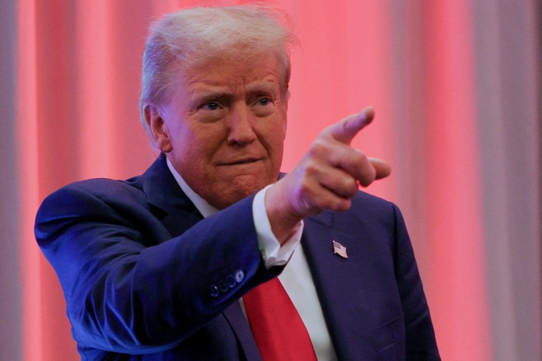 FILE PHOTO: U.S. President-elect Donald Trump gestures as he meets with House Republicans on Capitol Hill in Washington, U.S., November 13, 2024. REUTERS/Brian Snyder/File Photo