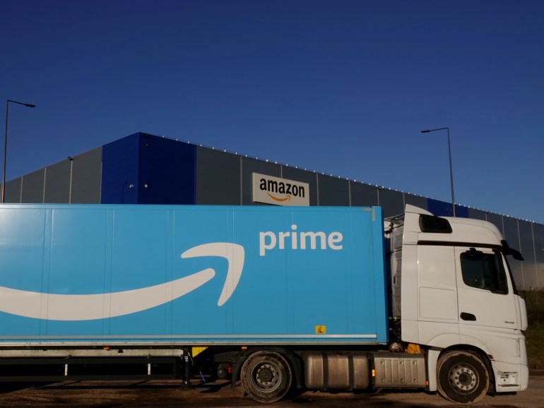 The logo of Amazon Prime Delivery is seen on the trailer of a truck outside the company logistics center in Lauwin-Planque, northern France, December 30, 2019. Picture taken December 30, 2019. REUTERS/Pascal Rossignol