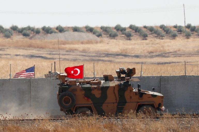 A Turkish military vehicle returns after a joint U.S.-Turkey patrol in northern Syria, as it is pictured from near the Turkish town of Akcakale, Turkey, September 8, 2019. REUTERS/Murad Sezer