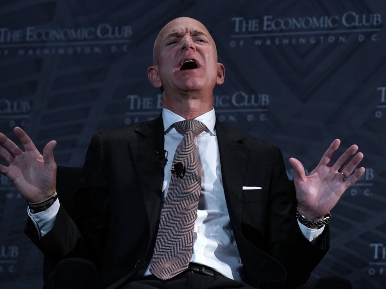 WASHINGTON, DC - SEPTEMBER 13: CEO and founder of Amazon Jeff Bezos participates in a discussion during a Milestone Celebration dinner September 13, 2018 in Washington, DC. Economic Club of Washington celebrated its 32nd anniversary at the event. Alex Wong/Getty Images/AFP== FOR NEWSPAPERS, INTERNET, TELCOS & TELEVISION USE ONLY ==