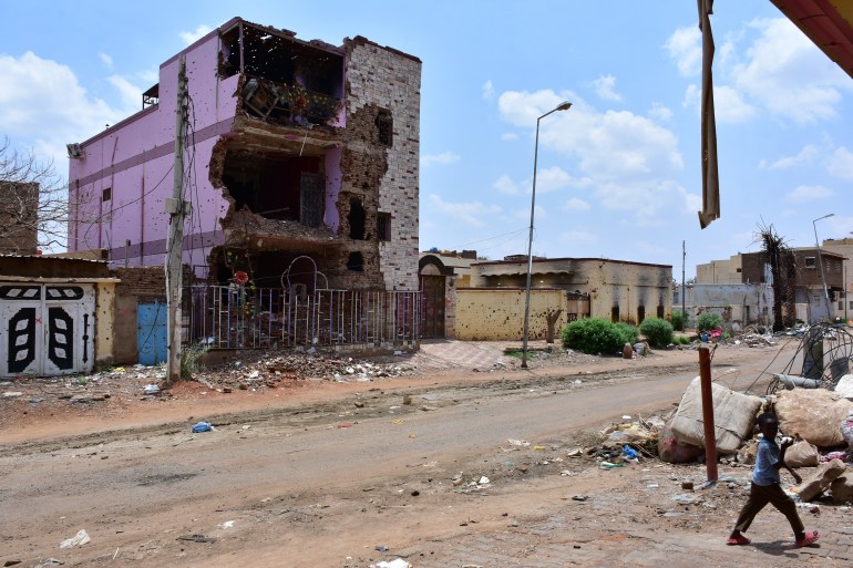 27 August 2024, Sudan, Omdurman: A destroyed building in Omdurman. A bloody power struggle has been raging in Sudan for almost 16 months. According to the UN, the conflict has triggered the world's largest refugee crisis. More than ten million people have been displaced or fled, many of them multiple times. Photo: Mudathir Hameed/dpa (Photo by Mudathir Hameed/picture alliance via Getty Images)