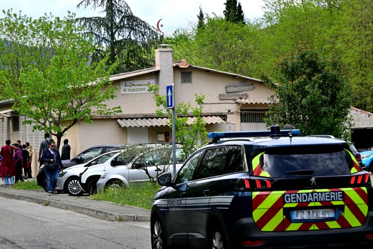 A French gendarmerie car patrols outside the mosque Khadija in La Grand-Combe, southern France, on April 27, 2025, following the murder of Aboubakar, a worshipper killed by several dozens of stab wounds inside the mosque on April 25.