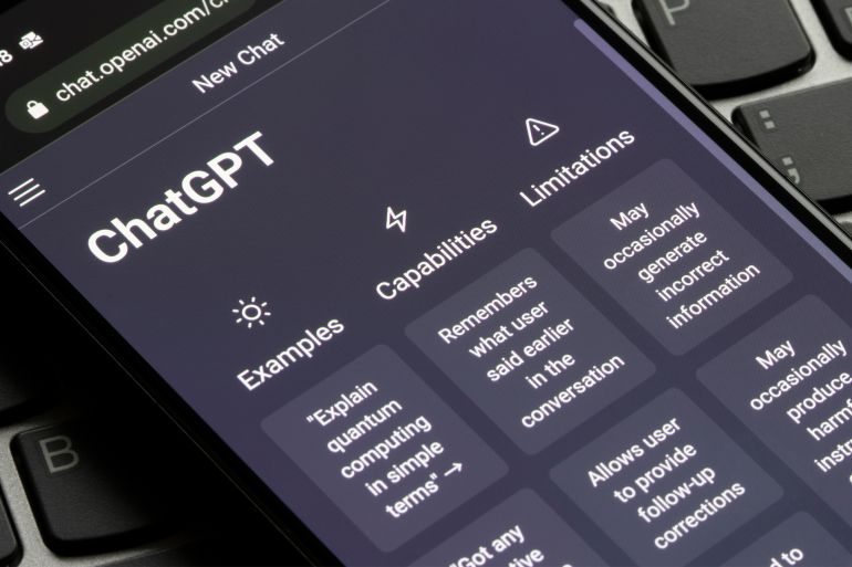Portland, OR, USA - Dec 18, 2022: Webpage of ChatGPT, a prototype AI chatbot, is seen on the website of OpenAI, on a smartphone. Examples, capabilities, and limitations are shown before a new chat. شترستوك
