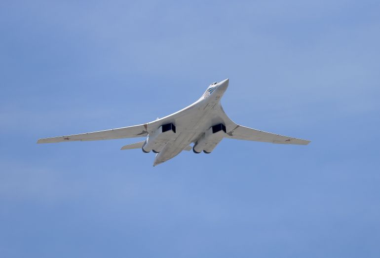 A Tupolev Tu-160 Blackjack strategic bomber flies over the Red Square during the Victory Day parade in Moscow