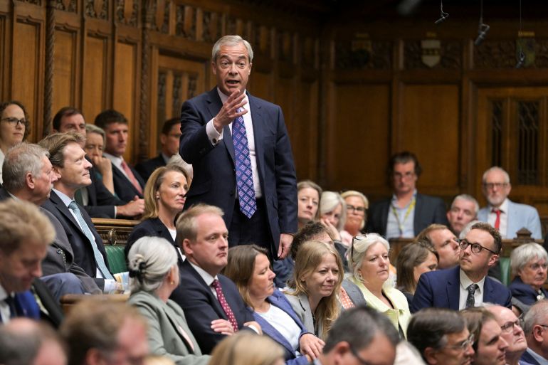 A handout photograph released by the UK Parliament shows President and MP for Reform UK party Nigel Farage speaking during Prime Minister's Questions (PMQ) session in the House of Commons, in central London, on May 14, 2025.