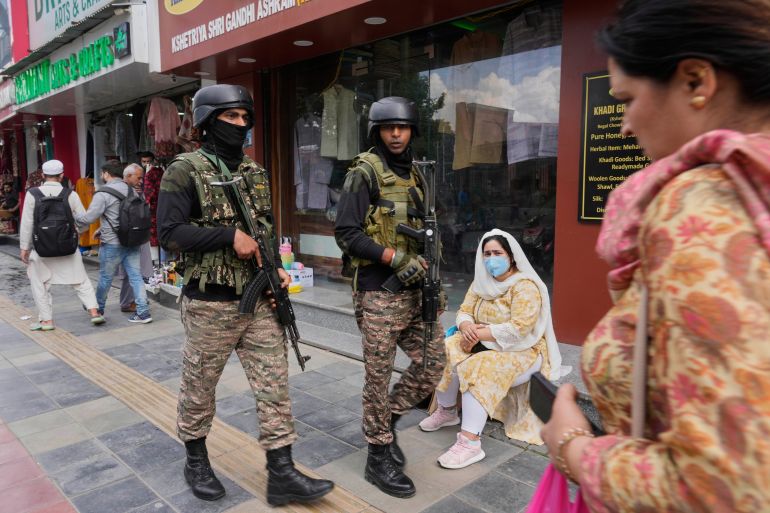 Indian soldiers guard after India and Pakistan reported no incidents of firing overnight, in Srinagar, Indian controlled Kashmir Monday, May 12, 2025. (AP Photo/Mukhtar Khan)