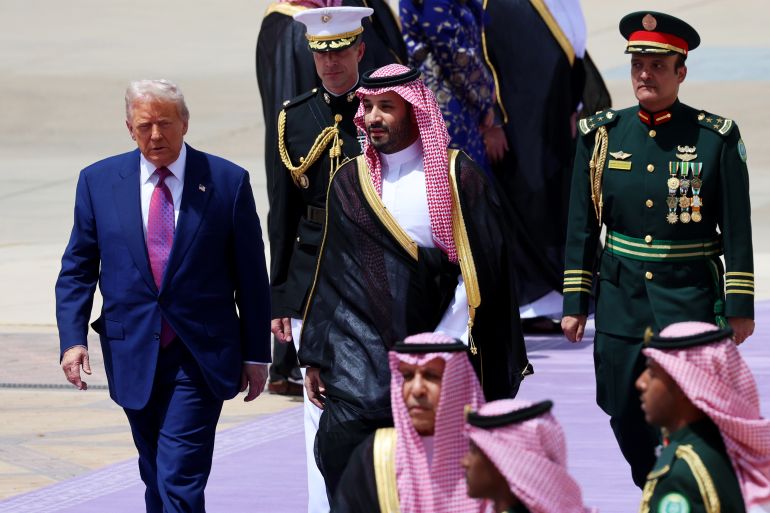 RIYADH, SAUDI ARABIA - MAY 13: U.S. President Donald Trump is greeted by Saudi Crown Prince Mohammed bin Salman as he arrives at King Khalid International Airport on May 13, 2025, in Riyadh, Saudi Arabia. Trump begins a multi-nation tour of the Gulf region focused on expanding economic ties and reinforcing security cooperation with key U.S. allies. (Photo by Win McNamee/Getty Images)