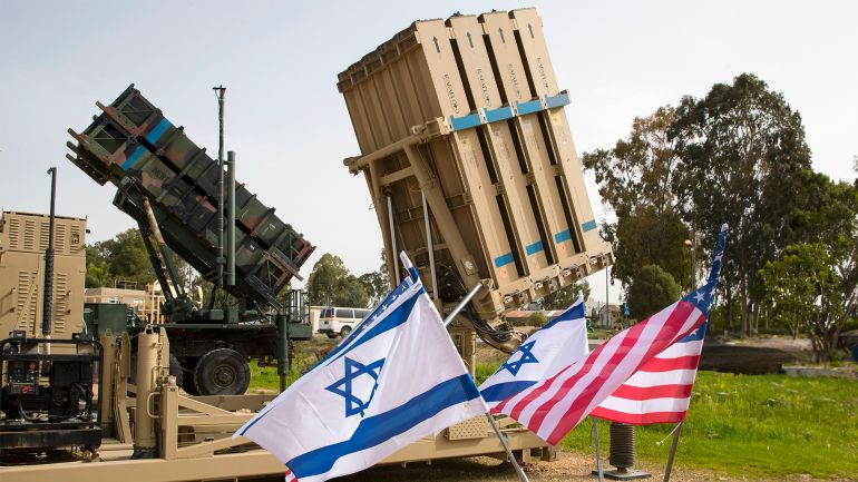An Israeli Iron Dome anti-rocket system, right, and an American Patriot missile defense system are shown during a joint U.S.-Israel military exercise on March 8, 2018. (Jack Guez/AFP via Getty Images)