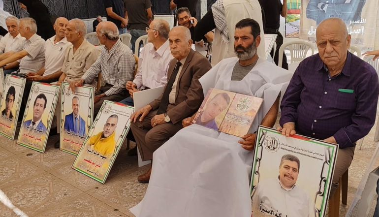 فلسطين- عزيزة نوفل- رام الله- اعتصام للمطالبة بتسليم جثامين الشهداء - الجزيرة نت (1)
