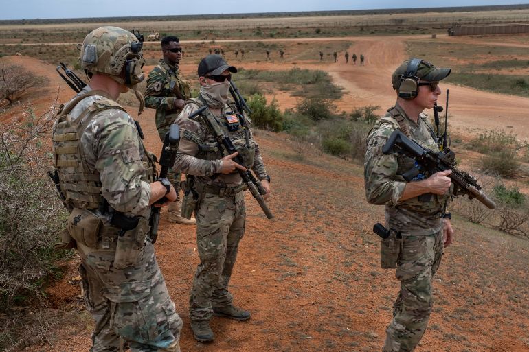 BALEDOGLE, SOMALIA - AUGUST 3, 2023: Soldiers of the Somali National Army commando force, Danab training, and demonstrating their skills at Baledogle airfield where they are being trained by US special operations Navy Seals commandos to help fight Al-Shabab Islamic militants. August 3, 2023 in Baledogle, Somalia. Danab forces are initially trained by Bancroft Global Development, a U.S. private military contractor, and then trained in specialized skills by US Special Operations Navy Seals Commandos. (Photo by Jonathan Torgovnik/Getty Images)