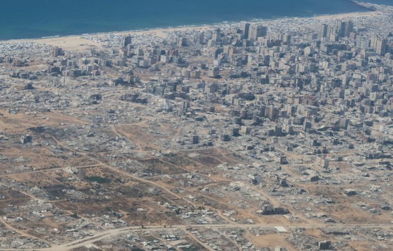 An aerial view shows damaged buildings in Gaza, July 28, 2025. REUTERS/Jehad Shelbak