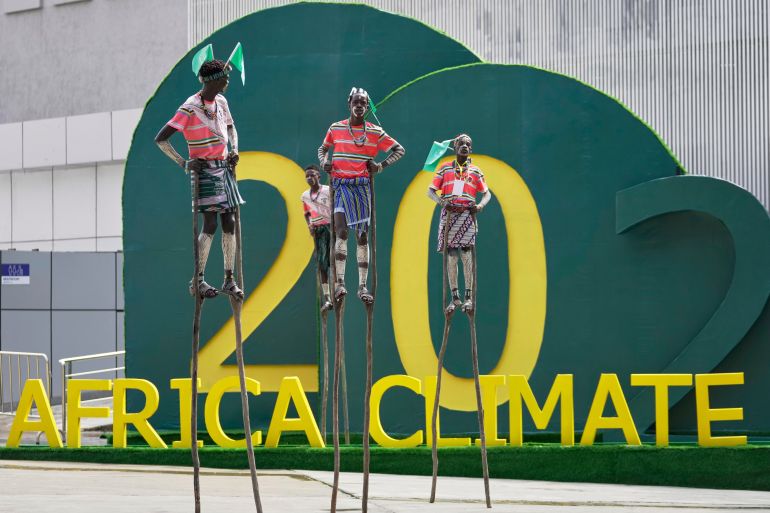Artists walk on stilts during the Second Africa Climate Summit (ACS2) in Addis Ababa, Ethiopia, Monday, September 8, 2025. (AP Photo/Brian Inganga)